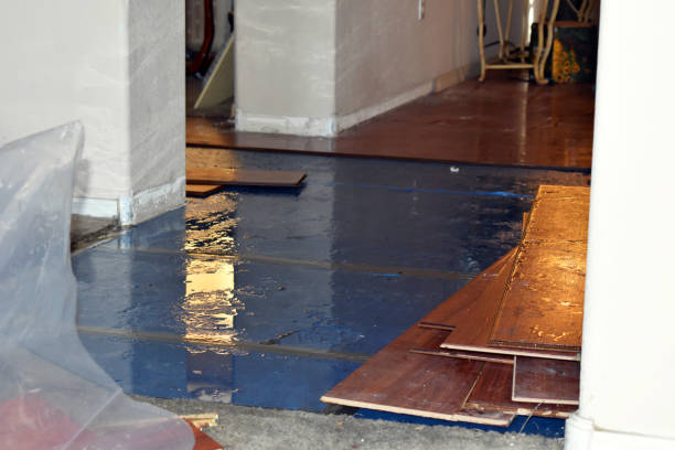 Professional Flood Damage Restoration technician working in Corona, CA
